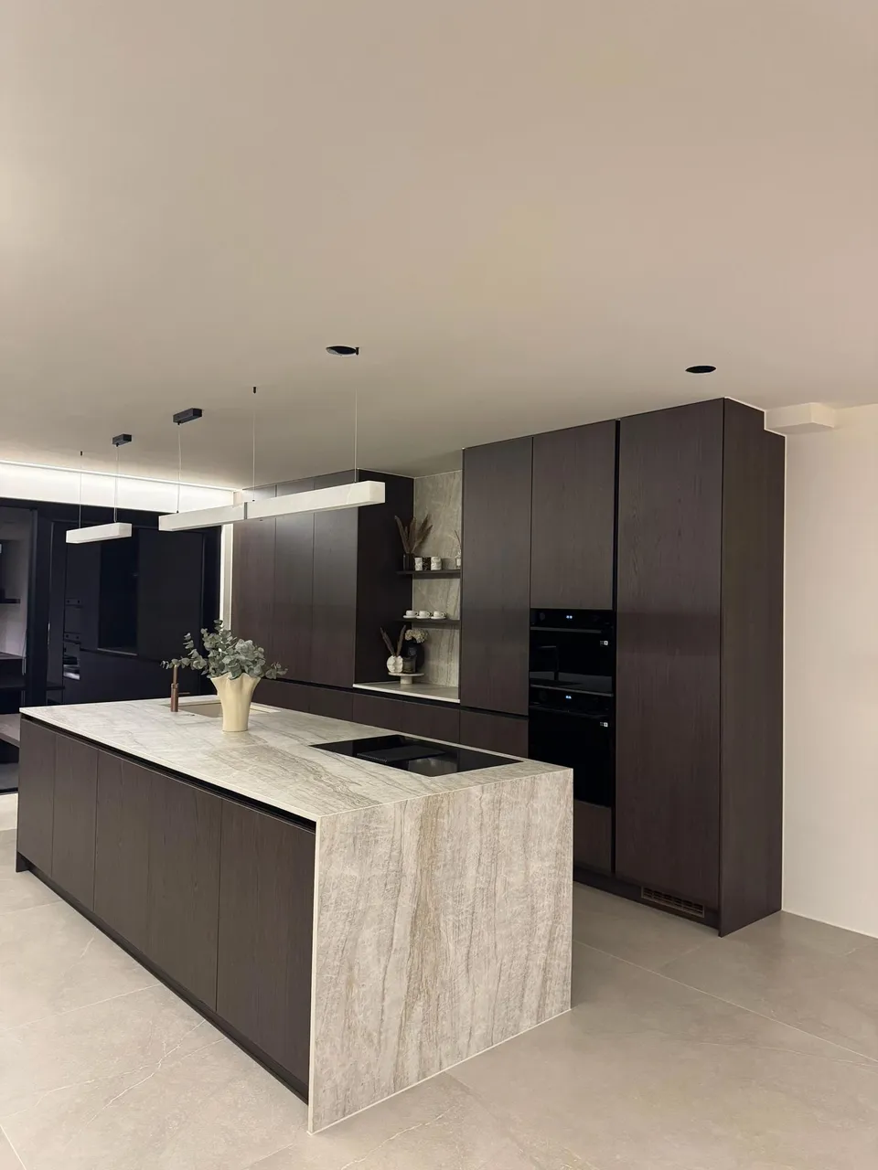 Delivered kitchen with graphite fronts and stone-effect island