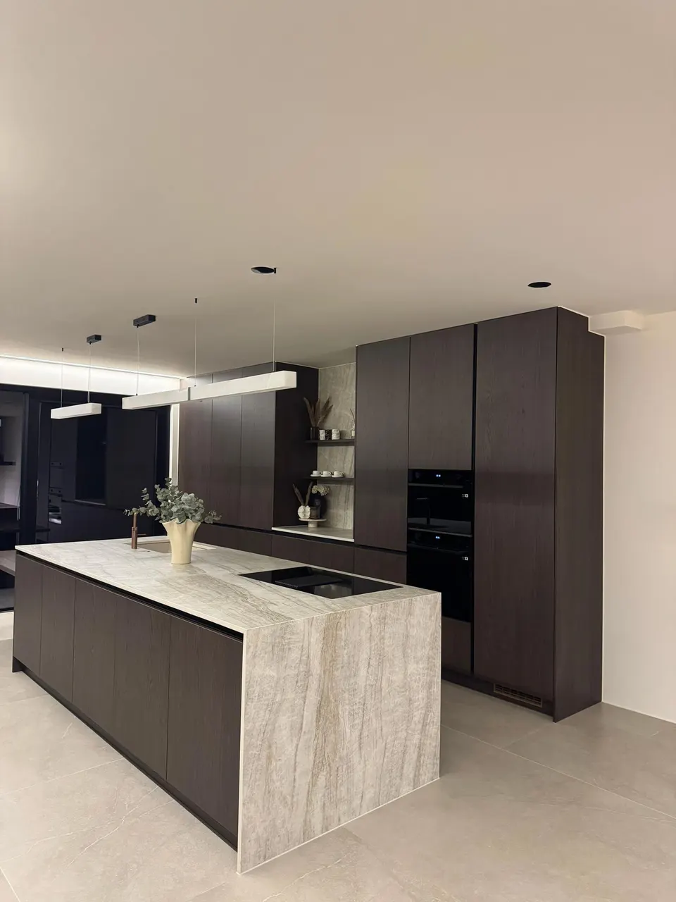 Delivered kitchen with graphite fronts and stone-effect island